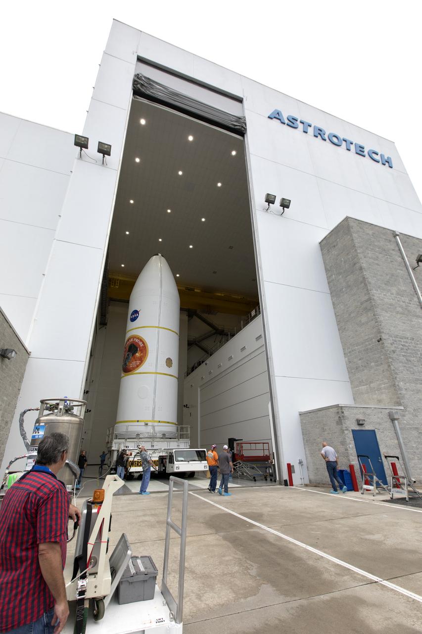 Encapsulated in its payload fairing, NASA's Parker Solar Probe is transported out of the Astrotech processing facility in Titusville, Florida, near the agency's Kennedy Space Center, on Monday, July 30, 2018. The spacecraft is beginning a trek to Space Launch Complex 37 at Cape Canaveral Air Force Station where it will be mated atop a United Launch Alliance Delta IV Heavy rocket. The mission will perform the closest-ever observations of a star when it travels through the Sun's atmosphere, called the corona. The probe will rely on measurements and imaging to revolutionize our understanding of the corona and the Sun-Earth connection.