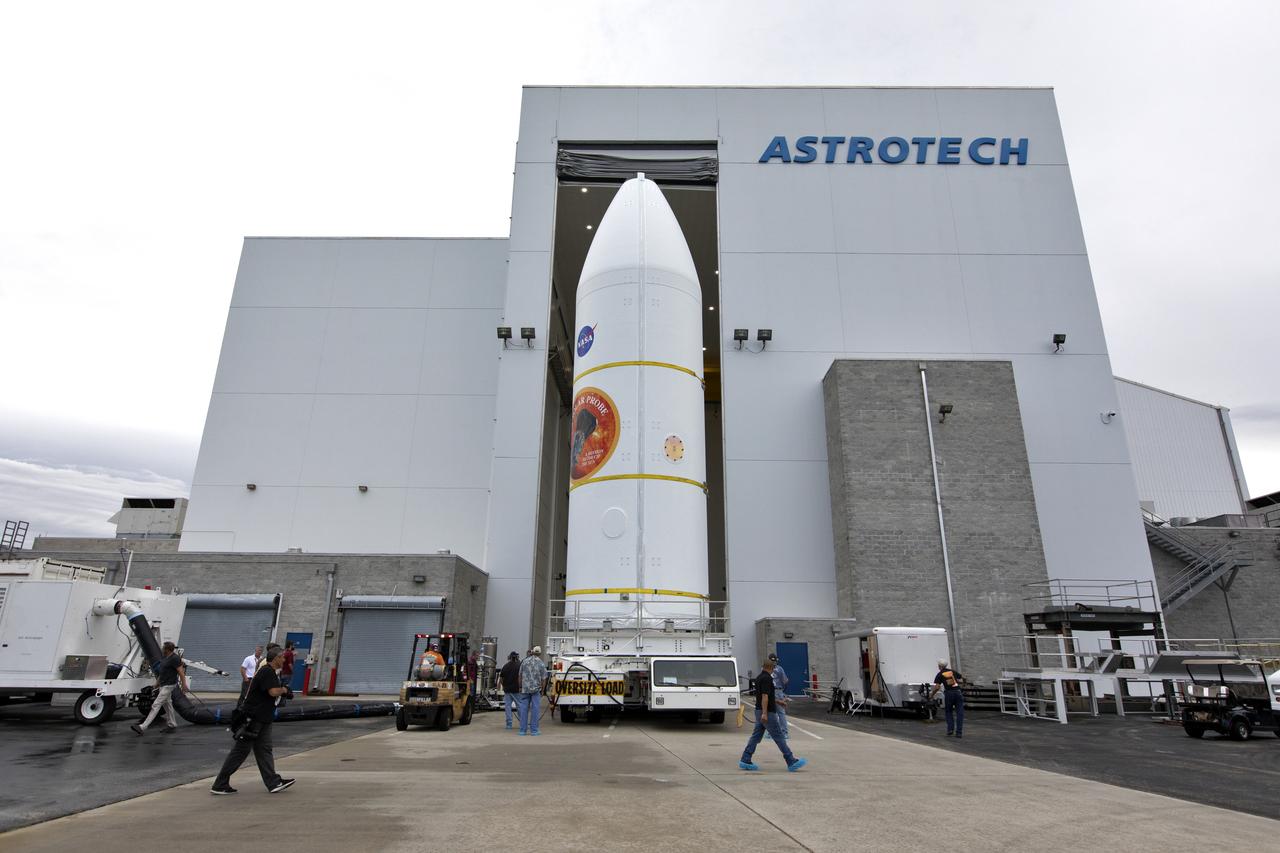 Encapsulated in its payload fairing, NASA's Parker Solar Probe is transported out of the Astrotech processing facility in Titusville, Florida, near the agency's Kennedy Space Center, on Monday, July 30, 2018. The spacecraft is beginning a trek to Space Launch Complex 37 at Cape Canaveral Air Force Station where it will be mated atop a United Launch Alliance Delta IV Heavy rocket. The mission will perform the closest-ever observations of a star when it travels through the Sun's atmosphere, called the corona. The probe will rely on measurements and imaging to revolutionize our understanding of the corona and the Sun-Earth connection.
