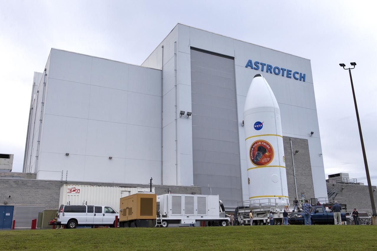 Encapsulated in its payload fairing, NASA's Parker Solar Probe is transported out of the Astrotech processing facility in Titusville, Florida, near the agency's Kennedy Space Center, on Monday, July 30, 2018. The spacecraft is beginning a trek to Space Launch Complex 37 at Cape Canaveral Air Force Station where it will be mated atop a United Launch Alliance Delta IV Heavy rocket. The mission will perform the closest-ever observations of a star when it travels through the Sun's atmosphere, called the corona. The probe will rely on measurements and imaging to revolutionize our understanding of the corona and the Sun-Earth connection.