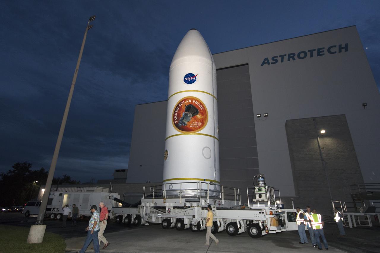 Encapsulated in its payload fairing, NASA's Parker Solar Probe is transported out of the Astrotech processing facility in Titusville, Florida, near the agency's Kennedy Space Center, on Monday, July 30, 2018. The spacecraft is beginning a trek to Space Launch Complex 37 at Cape Canaveral Air Force Station where it will be mated atop a United Launch Alliance Delta IV Heavy rocket. The mission will perform the closest-ever observations of a star when it travels through the Sun's atmosphere, called the corona. The probe will rely on measurements and imaging to revolutionize our understanding of the corona and the Sun-Earth connection.