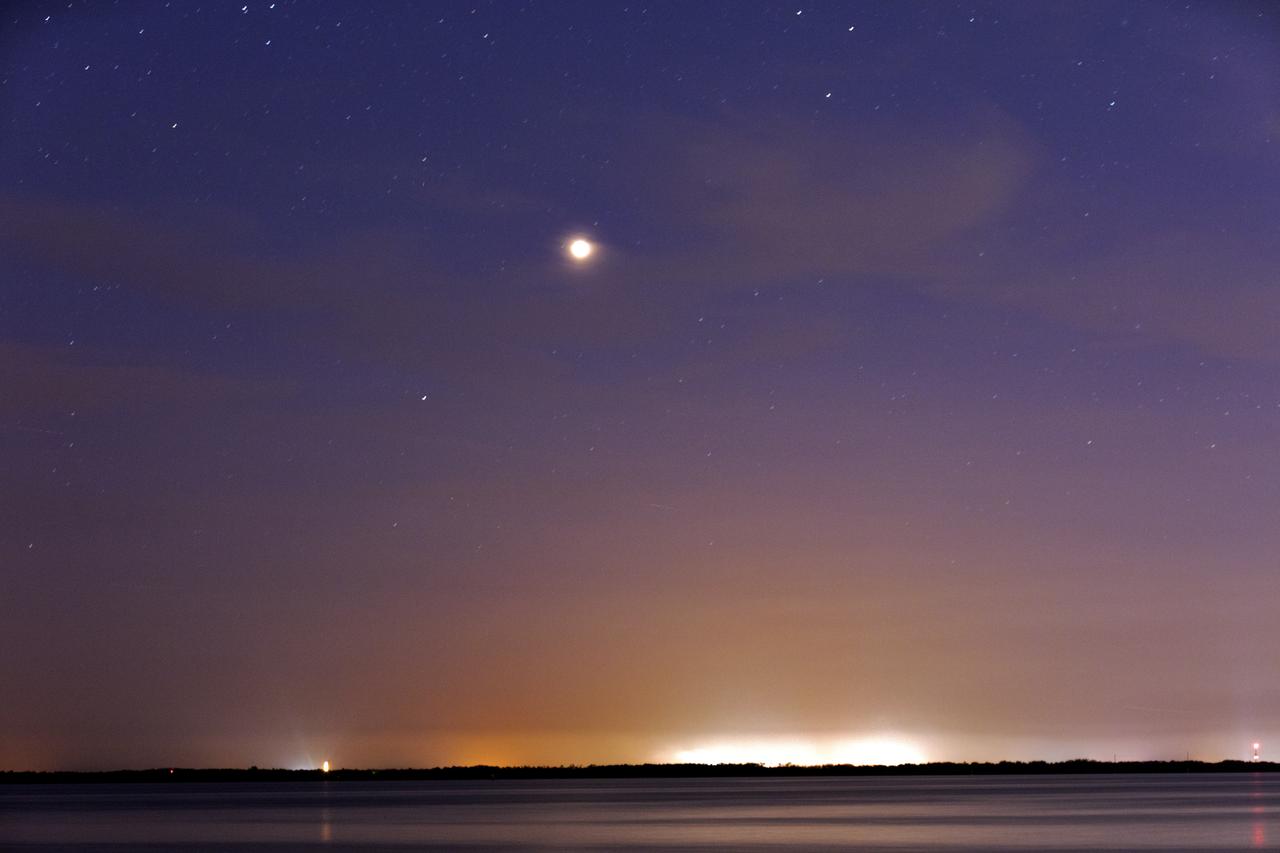 Mars shines brightly in the sky over Port Canaveral in Florida on Monday, July 30, 2018. The Red Planet appeared the brightest from July 27 to July 30, making its closest approach to Earth on July 31. The next Mars close approach is Oct. 6, 2020. A close approach is when Mars and Earth come nearest to each other in their orbits around the Sun.
