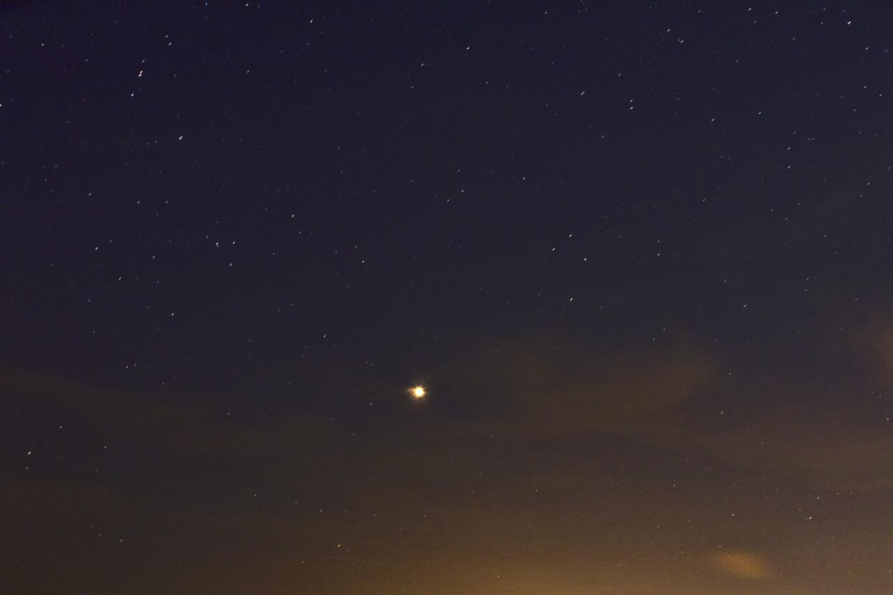 Mars shines brightly in the sky over Port Canaveral in Florida on Monday, July 30, 2018. The Red Planet appeared the brightest from July 27 to July 30, making its closest approach to Earth on July 31. The next Mars close approach is Oct. 6, 2020. A close approach is when Mars and Earth come nearest to each other in their orbits around the Sun.