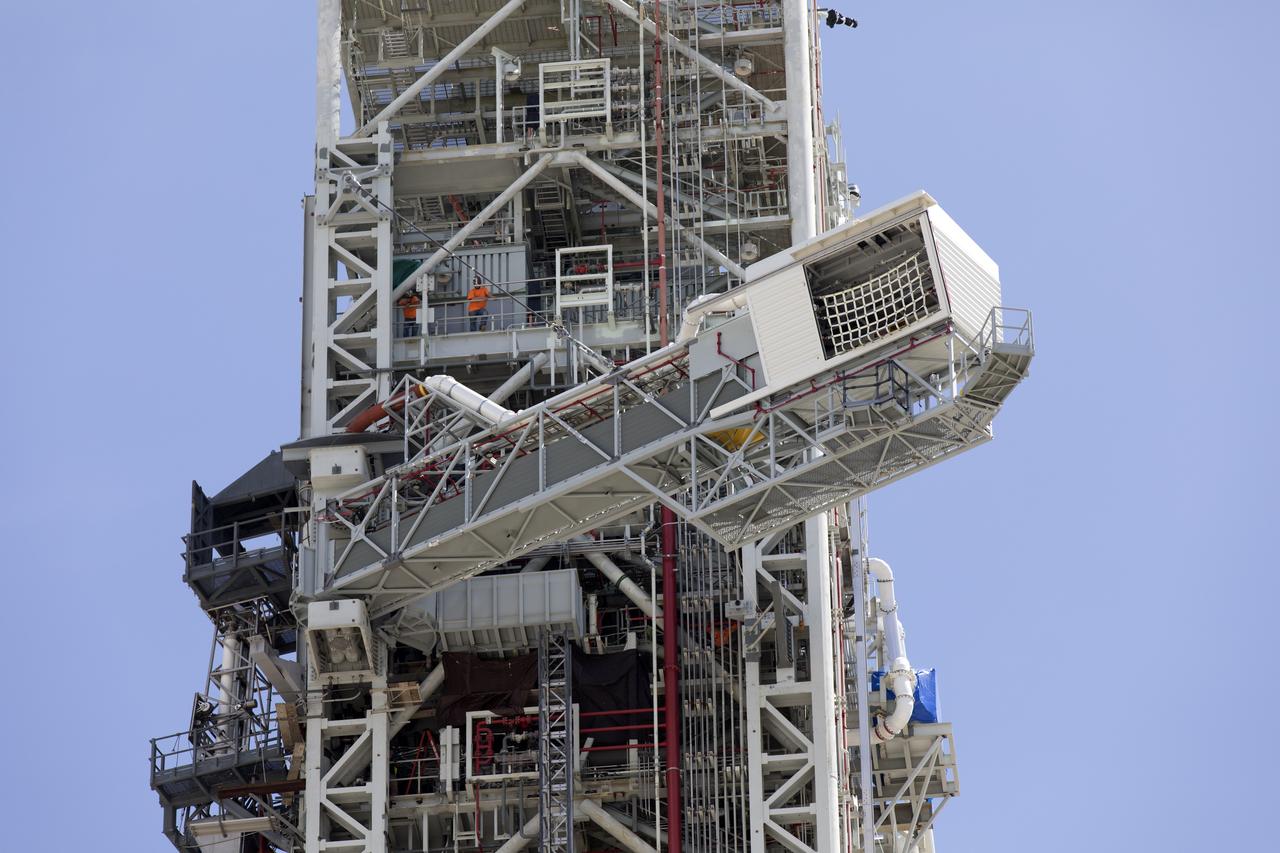 Technicians and engineers with Exploration Ground Systems at the NASA's Kennedy Space Center in Florida recently tested the Crew Access Arm (CAA) that was added on the mobile launcher being prepared to support the agency’s Orion spacecraft and Space Launch System rocket. The crucial test confirmed the functionality and integrity of the CAA. The CAA is designed to rotate from its retracted position and line up with Orion's crew hatch. The arm will provide entry and emergency egress for astronauts and technicians into and out of the Orion spacecraft.