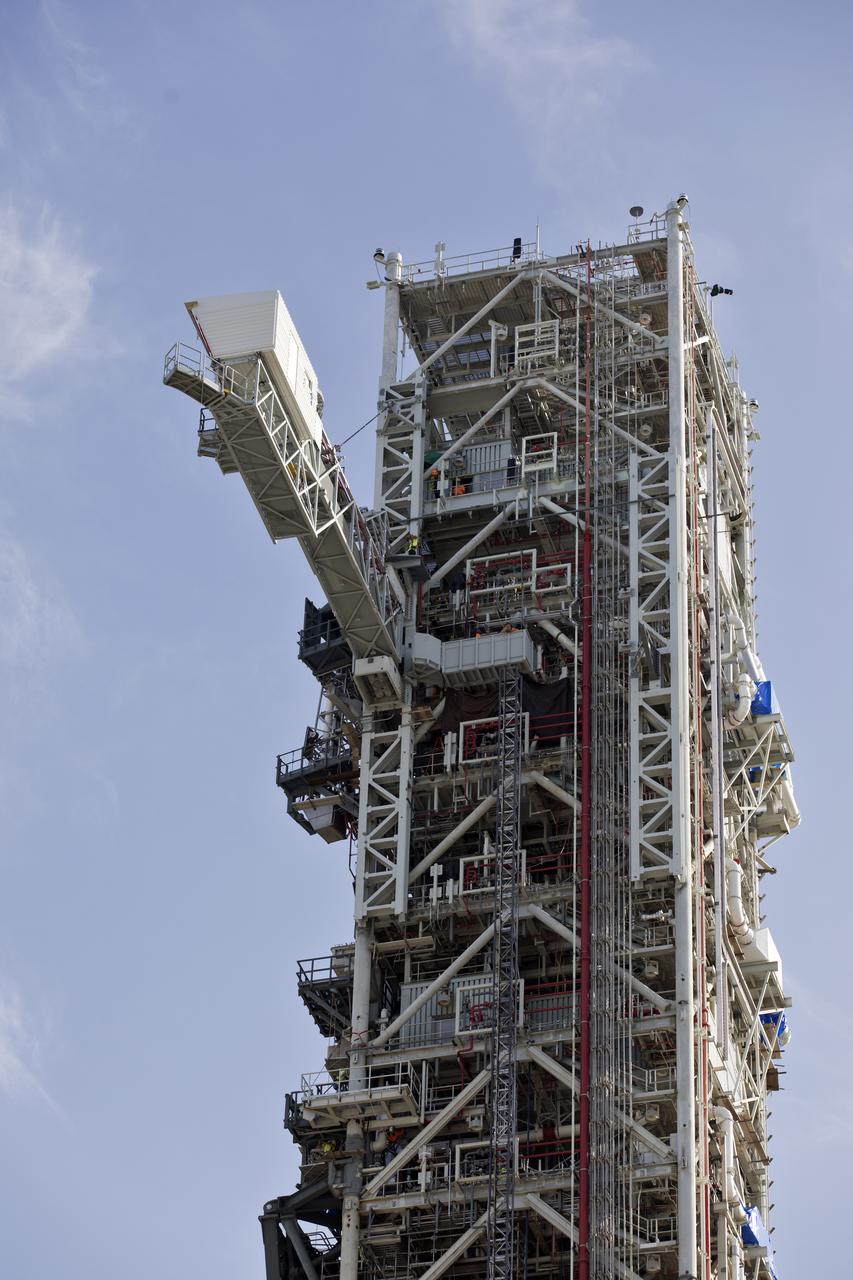 Technicians and engineers with Exploration Ground Systems at the NASA's Kennedy Space Center in Florida recently tested the Crew Access Arm (CAA) that was added on the mobile launcher being prepared to support the agency’s Orion spacecraft and Space Launch System rocket. The crucial test confirmed the functionality and integrity of the CAA. The CAA is designed to rotate from its retracted position and line up with Orion's crew hatch. The arm will provide entry and emergency egress for astronauts and technicians into and out of the Orion spacecraft.