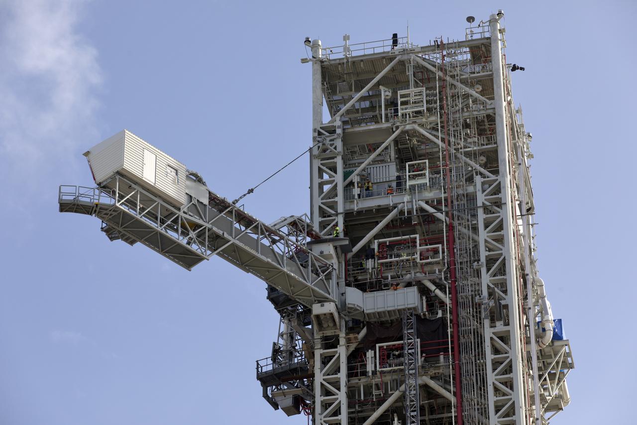 Technicians and engineers with Exploration Ground Systems at the NASA's Kennedy Space Center in Florida recently tested the Crew Access Arm (CAA) that was added on the mobile launcher being prepared to support the agency’s Orion spacecraft and Space Launch System rocket. The crucial test confirmed the functionality and integrity of the CAA. The CAA is designed to rotate from its retracted position and line up with Orion's crew hatch. The arm will provide entry and emergency egress for astronauts and technicians into and out of the Orion spacecraft.