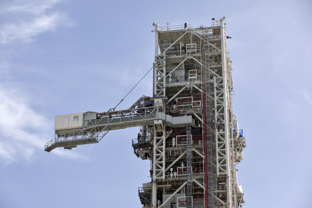 Technicians and engineers with Exploration Ground Systems at the NASA's Kennedy Space Center in Florida recently tested the Crew Access Arm (CAA) that was added on the mobile launcher being prepared to support the agency’s Orion spacecraft and Space Launch System rocket. The crucial test confirmed the functionality and integrity of the CAA. The CAA is designed to rotate from its retracted position and line up with Orion's crew hatch. The arm will provide entry and emergency egress for astronauts and technicians into and out of the Orion spacecraft.