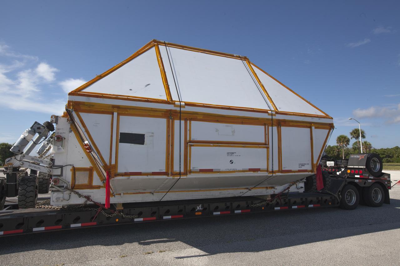 The Orion crew module pressure vessel for Exploration Mission-2 arrives at NASA's Kennedy Space Center in Florida on Aug. 24, 2018. The pressure vessel was transported in its Crew Module Transportation Fixture by super-wide transport truck from Michoud Assembly Facility near New Orleans. The pressure vessel is Orion's primary structure that holds the pressurized atmosphere astronauts will breathe and work in while in the vacuum of deep space. It will be moved into the Neil Armstrong Operations and Checkout Building high bay, where it will be secured on a precision alignment tool to begin preparing it for flight.