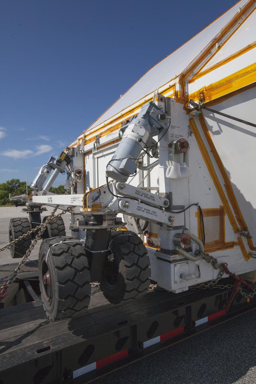 The Orion crew module pressure vessel for Exploration Mission-2 arrives at NASA's Kennedy Space Center in Florida on Aug. 24, 2018. The pressure vessel was transported in its Crew Module Transportation Fixture by super-wide transport truck from Michoud Assembly Facility near New Orleans. The pressure vessel is Orion's primary structure that holds the pressurized atmosphere astronauts will breathe and work in while in the vacuum of deep space. It will be moved into the Neil Armstrong Operations and Checkout Building high bay, where it will be secured on a precision alignment tool to begin preparing it for flight.