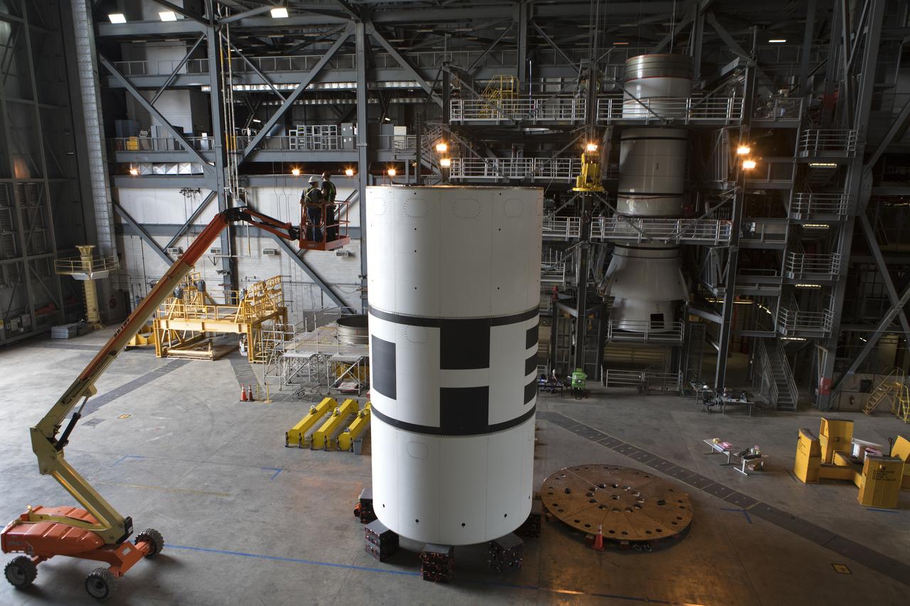 The aeroshells for Orion's Launch Abort System (LAS) are being stacked in High Bay 4 of the Vehicle Assembly Building on Aug. 3, 2018, at NASA's Kennedy Space Center in Florida. The aeroshells are being prepared for a full-stress test of the LAS, called Ascent Abort-2 (AA-2) flight test, scheduled for April 2019. During the test, a booster will launch from Space Launch Complex 46 at Cape Canaveral Air Force Station, carrying a fully functional LAS and a 22,000-pound Orion test vehicle to an altitude of 31,000 feet and traveling at more than 1,000 miles an hour. The test will verify the LAS can steer the crew module and astronauts aboard to safety in the event of an issue with the Space Launch System (SLS) rocket when the spacecraft is under the highest aerodynamic loads it will experience during a rapid climb into space. Orion is being prepared for its first integrated uncrewed flight atop the SLS on Exploration Mission-1.