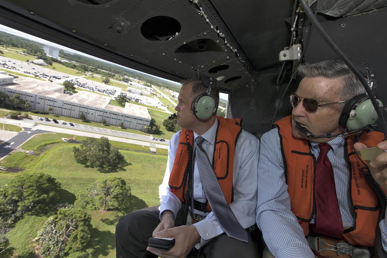 NASA Administrator Jim Bridenstine, left, made his first official visit to the agency's Kennedy Space Center on Monday, Aug. 6, 2018. His up-close look at the premier, multi-user spaceport began with Center Director Bob Cabana giving the administrator a helicopter tour over the bustling Florida spaceport that included the center's Industrial Area.
