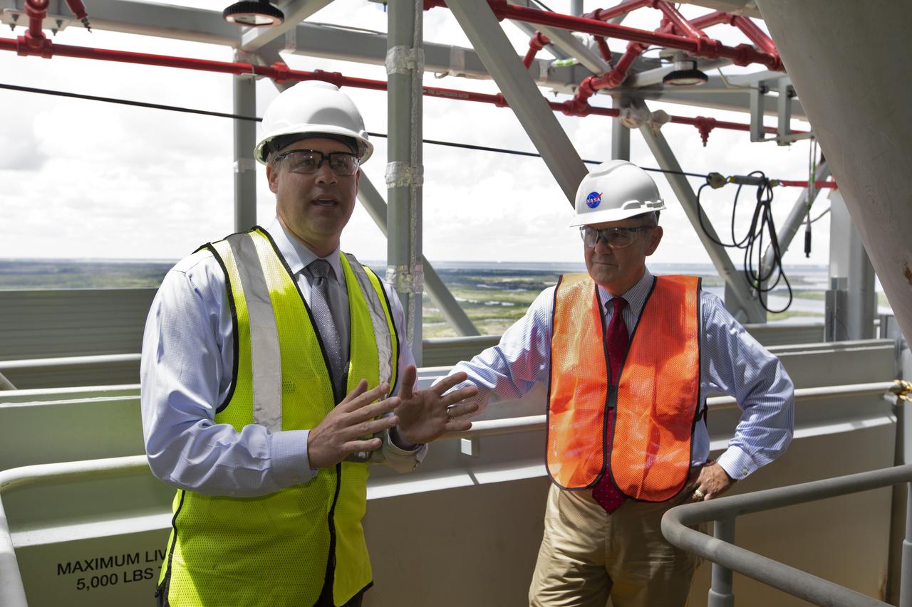 NASA Administrator Jim Bridenstine (left) is briefed by Kennedy Space Center Director Bob Cabana on testing of the mobile launcher that will support the agency's Space Launch System rocket and Orion spacecraft that will liftoff on trips to the Moon, Mars and deep space. Bridenstine made his first official visit to the NASA's Florida spaceport on Aug. 6 and 7, 2018.