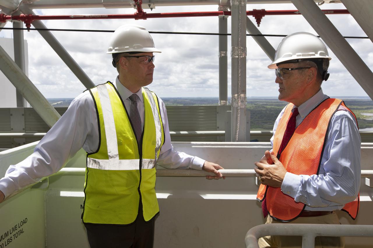 NASA Administrator Jim Bridenstine (left) is briefed by Kennedy Space Center Director Bob Cabana on testing of the mobile launcher that will support the agency's Space Launch System rocket and Orion spacecraft that will liftoff on trips to the Moon, Mars and deep space. Bridenstine made his first official visit to the NASA's Florida spaceport on Aug. 6 and 7, 2018.