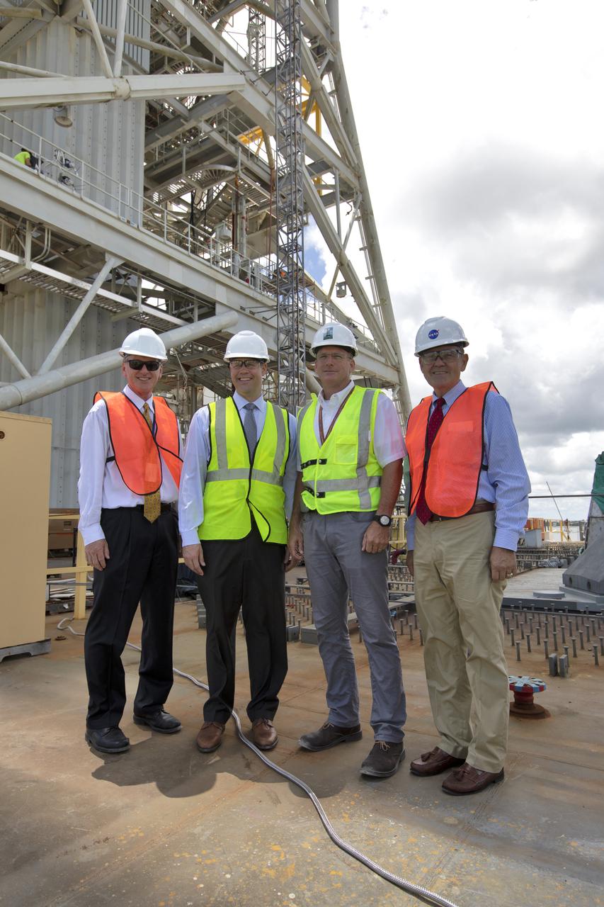 NASA Administrator Jim Bridenstine (second from left) is briefed on testing of the mobile launcher that will support the agency's Space Launch System rocket and Orion spacecraft that will liftoff on trips to the Moon, Mars and deep space. From the left, are Mike Bolger, Exploration Ground Systems program manager, Bridenstine, Cliff Lanham, Mobile Launcher Project Manager, and Center Director Bob Cabana. Bridenstine made his first official visit to the NASA's Kennedy Space Center on Aug. 6 and 7, 2018.