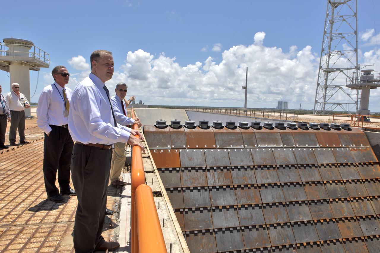During a tour of NASA's Kennedy Space Center, agency Administrator Jim Bridenstine looks into the flame trench at Launch Complex 39B. This will be the site where NASA's Space Launch System rocket and Orion spacecraft will liftoff on trips to the Moon, Mars and deep space. Bridenstine made his first official visit to the Florida spaceport on Aug. 6 and 7, 2018.