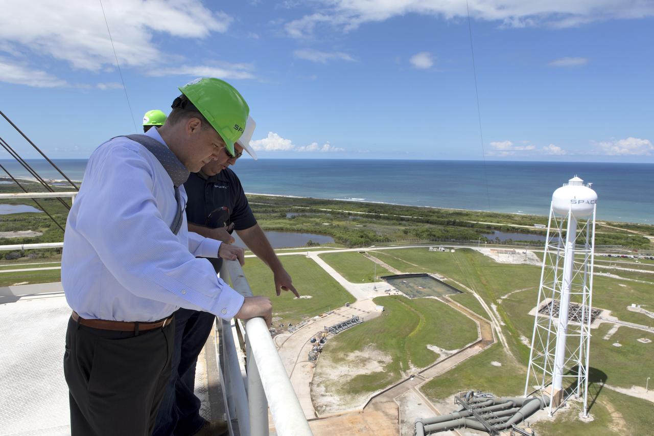 NASA Administrator Jim Bridenstine, in the green safety helmet, tours SpaceX Launch Complex 39A, on Aug. 8, 2018, at the agency's Kennedy Space Center in Florida. Bridenstine received updates on SpaceX accomplishments for NASA's Commercial Crew Program.