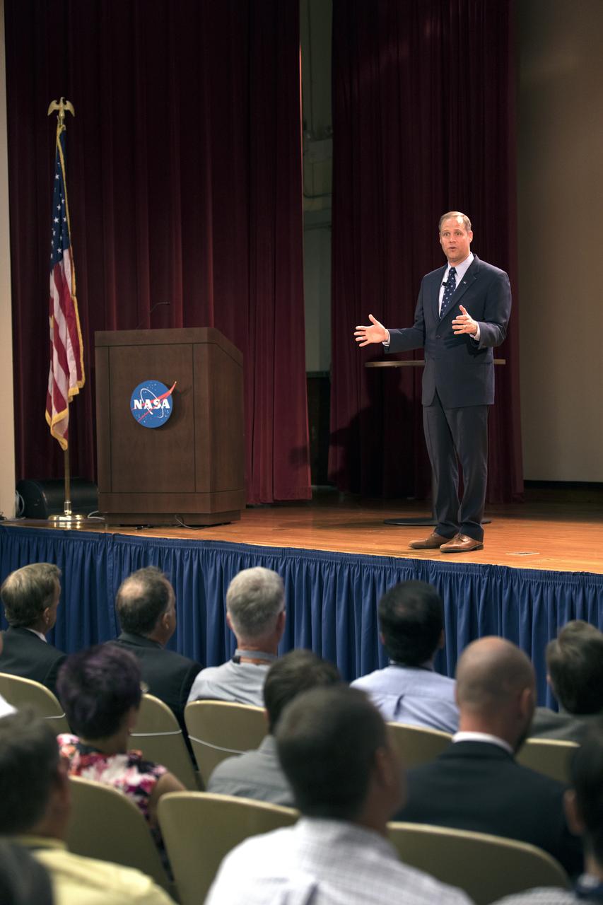 NASA Administrator Jim Bridenstine talks with workers during an All Hands meeting on Aug. 7, 2018, in the Training Auditorium at the agency's Kennedy Space Center in Florida.