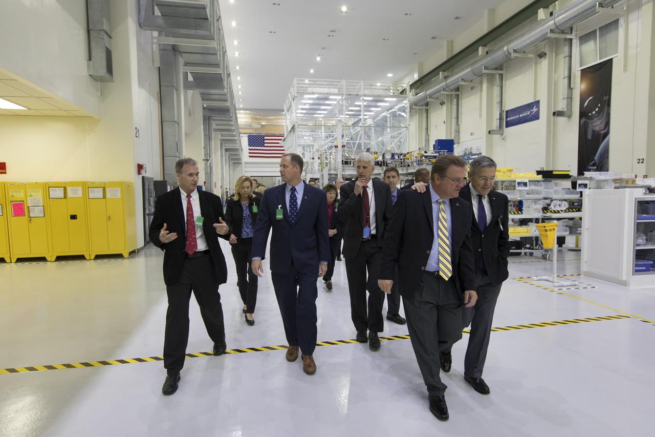 NASA Administrator Jim Bridenstine, second from left, tours Kennedy Space Center’s Neil Armstrong Operations and Checkout Building during his first official visit to the Florida spaceport on Tuesday, Aug. 7, 2018. The tour featured updates on NASA’s Orion spacecraft, which will launch aboard the agency’s Space Launch System rocket on trips to deep space.