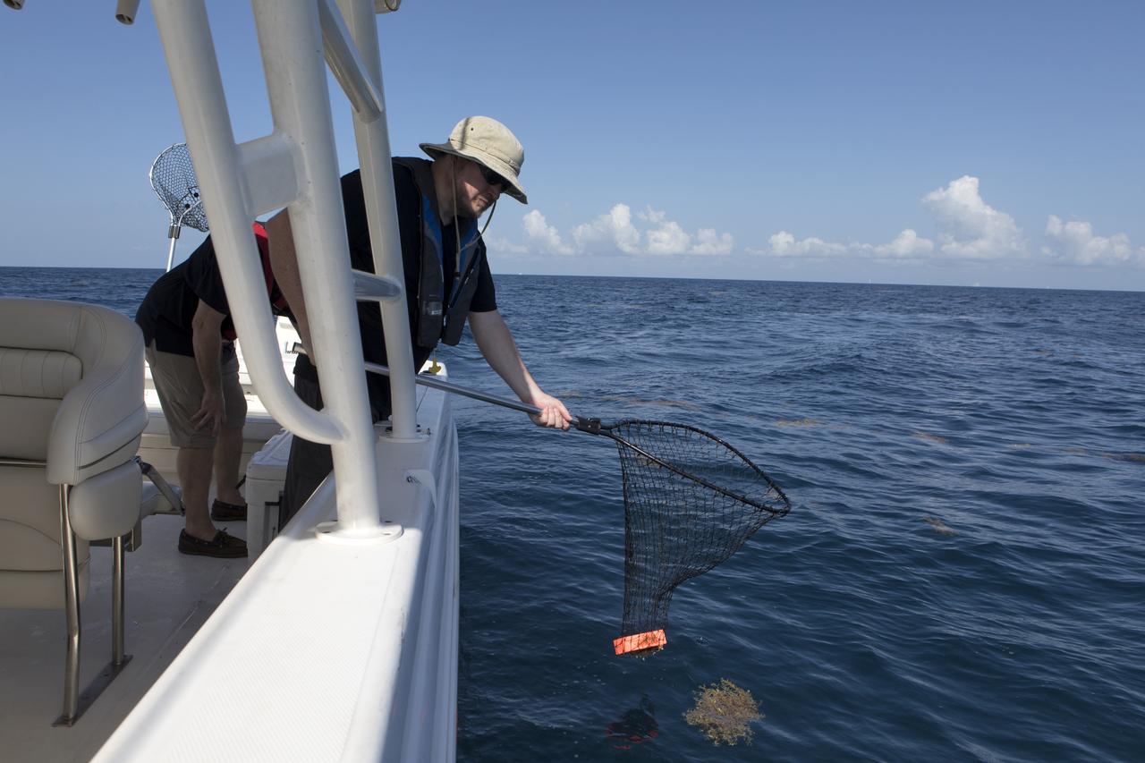 Members of the Ascent Abort-2 (AA-2) Flight Test team perform a drop test of data recording devices about 10 miles off the coast of NASA’s Kennedy Space Center in Florida on Wednesday, Aug. 8, 2018. These devices, called Ejectable Data Recorders (EDRs), were tossed out of a helicopter hovering 5,000 feet over the Atlantic Ocean and retrieved by recovery boats. The AA-2 Flight Test team is evaluating how the systems in the devices react to elements encountered from the sky to the ocean. In April 2019, the EDRs will eject from the Orion test article during a scheduled test of the spacecraft’s Launch Abort System (LAS).