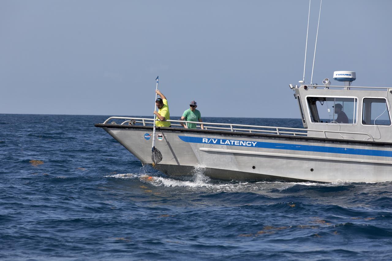 Members of the Ascent Abort-2 (AA-2) Flight Test team perform a drop test of data recording devices about 10 miles off the coast of NASA’s Kennedy Space Center in Florida on Wednesday, Aug. 8, 2018. These devices, called Ejectable Data Recorders (EDRs), were tossed out of a helicopter hovering 5,000 feet over the Atlantic Ocean and retrieved by recovery boats. The AA-2 Flight Test team is evaluating how the systems in the devices react to elements encountered from the sky to the ocean. In April 2019, the EDRs will eject from the Orion test article during a scheduled test of the spacecraft’s Launch Abort System (LAS).