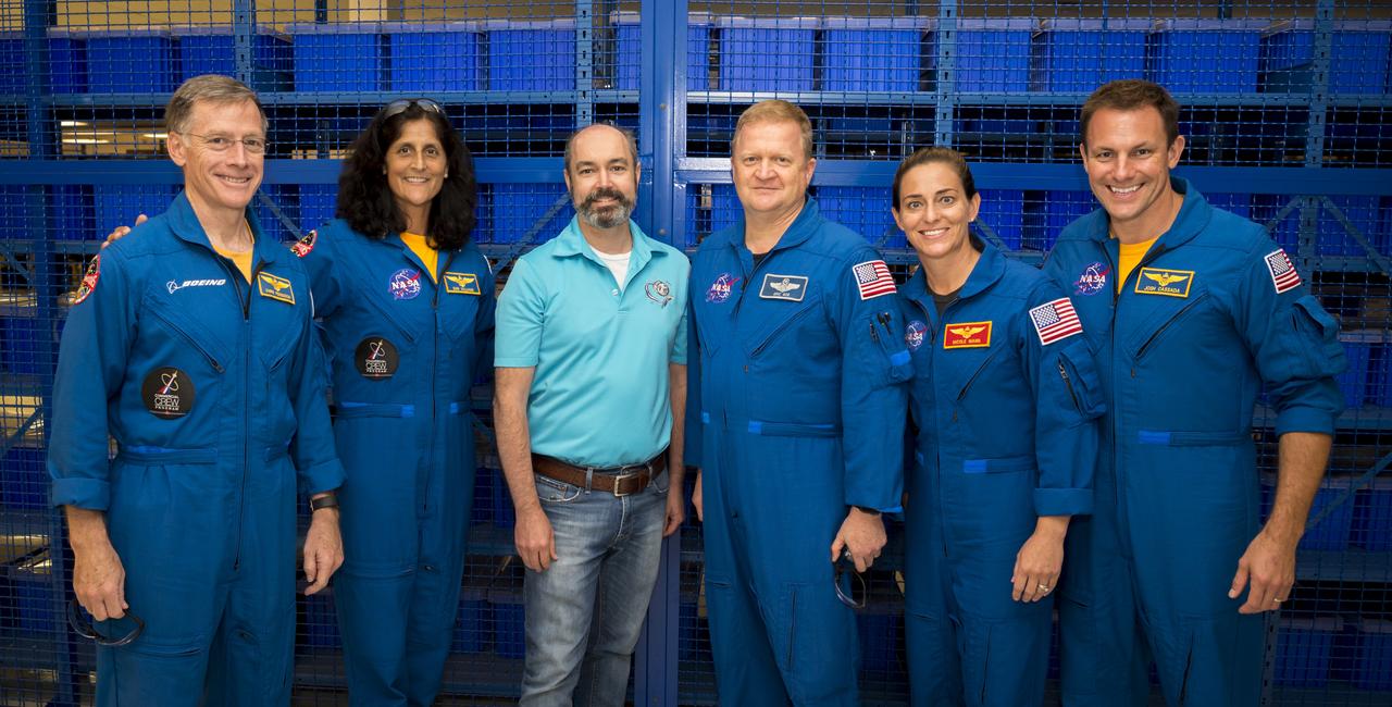 From left, commercial crew astronauts Chris Ferguson, Suni Williams, Eric Boe, Nicole Mann and Josh Cassada pose with an employee at Kennedy Space Center (KSC) in Florida. The astronauts visited with Boeing and United Launch Alliance employees at KSC about a week after their crew assignments on Boeing’s CST-100 Starliner were announced by NASA. They stopped by Boeing’s Commercial Crew and Cargo Processing Facility (C3PF) at KSC and Space Launch Complex 41 at Cape Canaveral Air Force Station to view progress on the Starliner and the launch pad. Boe, Ferguson and Mann will fly on the Starliner in Boeing’s upcoming Crew Flight Test to the International Space Station (ISS). Cassada and Williams are assigned to Boeing’s first operational mission to the ISS. Photo credit: Boeing