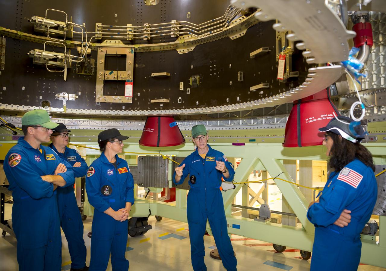 From left, commercial crew astronauts Josh Cassada, Eric Boe, Nicole Mann, Chris Ferguson and Suni Williams visit Kennedy Space Center (KSC) in Florida shortly after they were officially assigned to fly on Boeing’s CST-100 Starliner. The astronauts stopped by Boeing’s Commercial Crew and Cargo Processing Facility (C3PF) at KSC and Space Launch Complex 41 at Cape Canaveral Air Force Station to view progress on the Starliner and the launch pad. Boe, Ferguson and Mann will fly on Starliner in Boeing’s upcoming Crew Flight Test to the International Space Station (ISS). Cassada and Williams are assigned to Boeing’s first operational mission to the ISS. Photo credit: Boeing