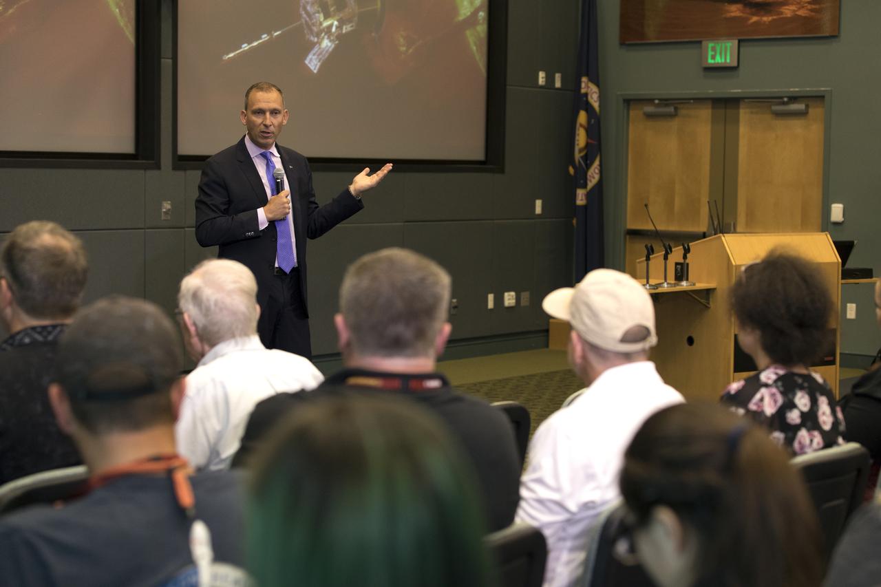 In the Kennedy Space Center's Operations and Support Building II, Thursday, Aug. 9, 2018, members of the media participate in a prelaunch mission briefing on NASA's Parker Solar Probe. Speaking to the media is Thomas Zurbuchen, associate administrator for NASA's Science Mission Directore in Washington. The Parker Solar Probe will lift off on a United Launch Alliance Delta IV Heavy rocket from Space Launch Complex 37 at Cape Canaveral Air Force Station in Florida. The spacecraft was built by Applied Physics Laboratory of Johns Hopkins University in Laurel, Maryland. The mission will perform the closest-ever observations of a star when it travels through the Sun's atmosphere, called the corona. The probe will rely on measurements and imaging to revolutionize our understanding of the corona and the Sun-Earth connection.