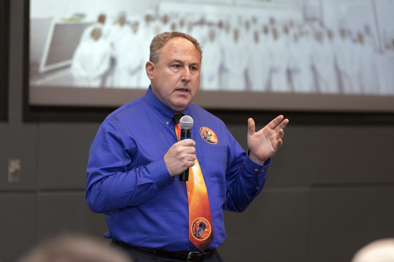 In the Kennedy Space Center's Operations and Support Building II, Thursday, Aug. 9, 2018, members of the media participate in a prelaunch mission briefing on NASA's Parker Solar Probe. Speaking to the media is Andy Driesman, Parker Solar Proble project manager, Johns Hopkins Applied Physics Laboratory. The Parker Solar Probe will lift off on a United Launch Alliance Delta IV Heavy rocket from Space Launch Complex 37 at Cape Canaveral Air Force Station in Florida. The spacecraft was built by Applied Physics Laboratory of Johns Hopkins University in Laurel, Maryland. The mission will perform the closest-ever observations of a star when it travels through the Sun's atmosphere, called the corona. The probe will rely on measurements and imaging to revolutionize our understanding of the corona and the Sun-Earth connection.