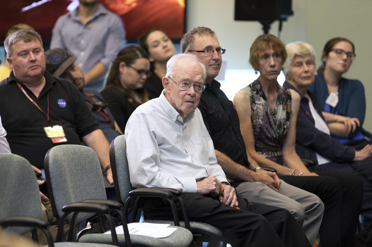 In the Kennedy Space Center's Operations and Support Building II, Thursday, Aug. 9, 2018, members of the media participate in a prelaunch mission briefing on NASA's Parker Solar Probe. Listening to the presentation is Eugene Parker, front row, far left, the S. Chandrasekhar Distinguished Service Professor Emeritus, Department of Astronomy and Astrophysics at the University of Chicago. This is the first NASA mission that has been named for a living individual. The Parker Solar Probe will lift off on a United Launch Alliance Delta IV Heavy rocket from Space Launch Complex 37 at Cape Canaveral Air Force Station in Florida. The spacecraft was built by Applied Physics Laboratory of Johns Hopkins University in Laurel, Maryland. The mission will perform the closest-ever observations of a star when it travels through the Sun's atmosphere, called the corona. The probe will rely on measurements and imaging to revolutionize our understanding of the corona and the Sun-Earth connection.