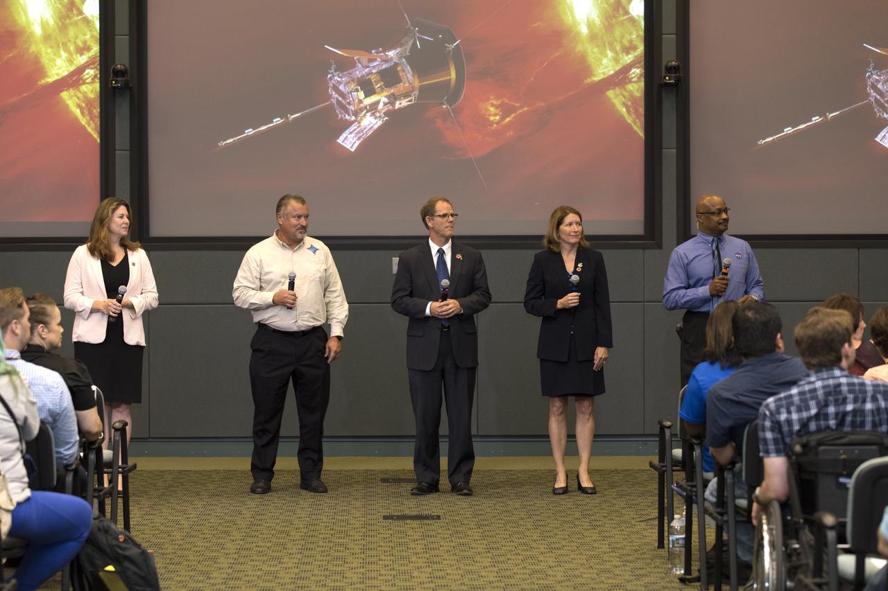 In the Kennedy Space Center's Operations and Support Building II, Thursday, Aug. 9, 2018, members of the media participate in a prelaunch mission briefing on NASA's Parker Solar Probe. Briefing moderators are Karen Fox, far left, Goddard Space Flight Center, and Dwayne Brown, far right, NASA Communications. Briefing participants are Omar Baez, launch director, NASA Kennedy Space Center; Scott Messer, program manager, NASA Programs, United Launch Alliance; and Kathy Rice, launch weather officer, 45th Weather Squadron, Cape Canaveral Air Force Station. The Parker Solar Probe will lift off on a United Launch Alliance Delta IV Heavy rocket from Space Launch Complex 37 at Cape Canaveral Air Force Station in Florida. The spacecraft was built by Applied Physics Laboratory of Johns Hopkins University in Laurel, Maryland. The mission will perform the closest-ever observations of a star when it travels through the Sun's atmosphere, called the corona. The probe will rely on measurements and imaging to revolutionize our understanding of the corona and the Sun-Earth connection.