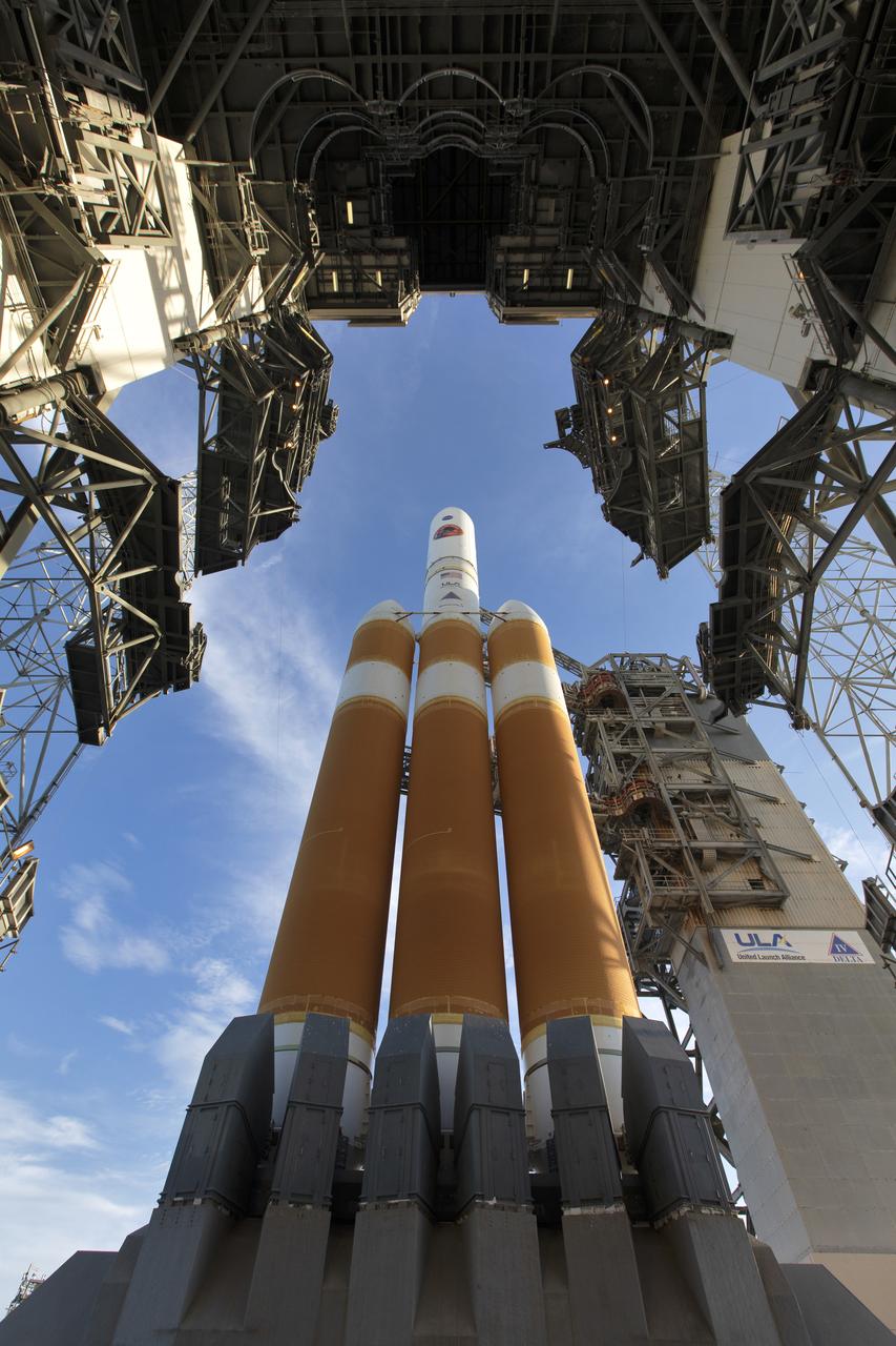 The United Launch Alliance Delta IV Heavy rocket that will launch NASA’s Parker Solar Probe on a mission to study to Sun is seen as the Mobile Service Tower gantry at Space Launch Complex 37 rolls back on Friday, Aug. 10, 2018, at Cape Canaveral Air Force Station in Florida. Parker Solar Probe will perform the closest-ever observations of a star when it travels through the Sun's atmosphere, called the corona. The probe will rely on measurements and imaging to revolutionize our understanding of the corona and the Sun-Earth connection.