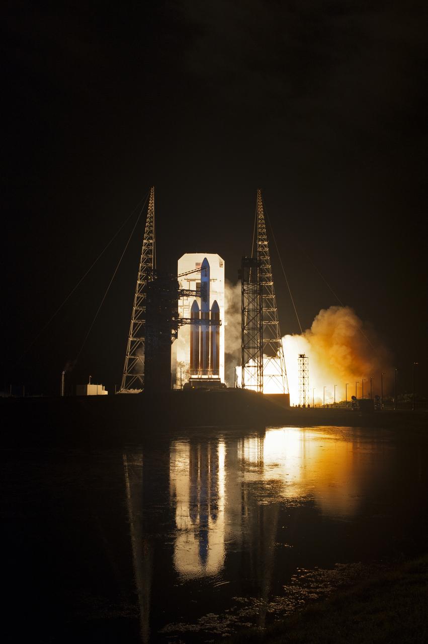 Lighting up the night sky at Cape Canaveral Air Force Station's Space Launch Complex 37, the United Launch Alliance Delta IV Heavy rocket with NASA's Parker Solar Probe, lifts off at 3:31 a.m. EDT on Sunday, Aug. 12, 2018. The spacecraft was built by Applied Physics Laboratory of Johns Hopkins University in Laurel, Maryland. The mission will perform the closest-ever observations of a star when it travels through the Sun's atmosphere, called the corona. The probe will rely on measurements and imaging to revolutionize our understanding of the corona and the Sun-Earth connection.