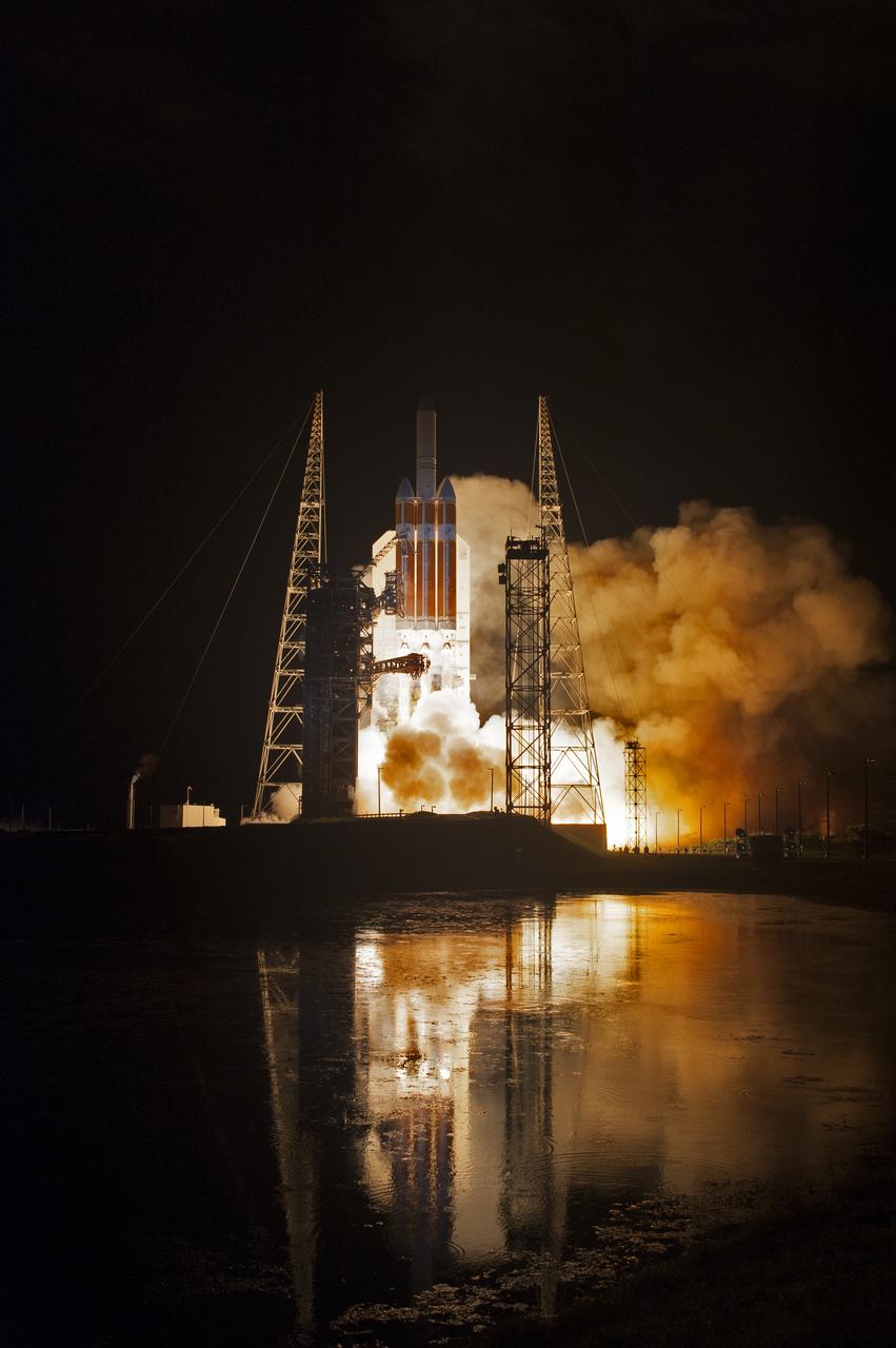 Lighting up the night sky at Cape Canaveral Air Force Station's Space Launch Complex 37, the United Launch Alliance Delta IV Heavy rocket with NASA's Parker Solar Probe, lifts off at 3:31 a.m. EDT on Sunday, Aug. 12, 2018. The spacecraft was built by Applied Physics Laboratory of Johns Hopkins University in Laurel, Maryland. The mission will perform the closest-ever observations of a star when it travels through the Sun's atmosphere, called the corona. The probe will rely on measurements and imaging to revolutionize our understanding of the corona and the Sun-Earth connection.
