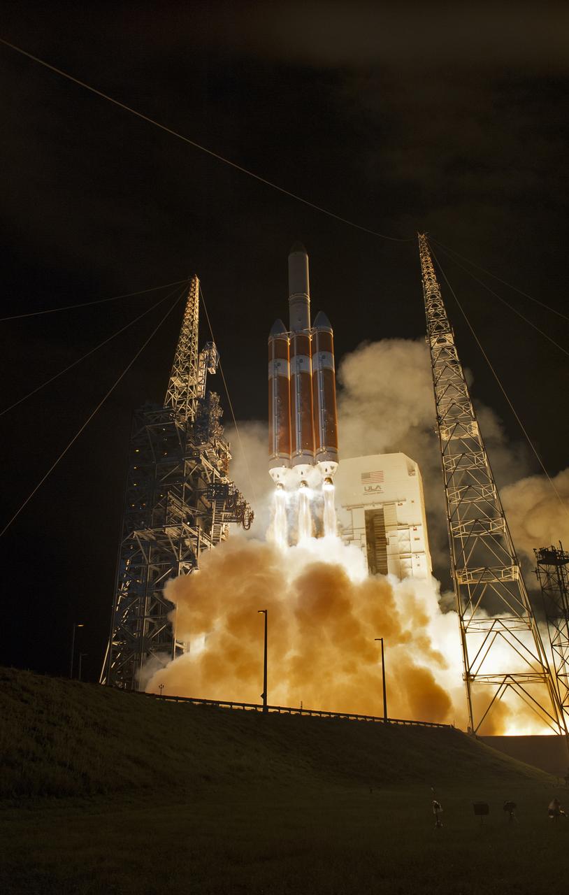 At Cape Canaveral Air Force Station's Space Launch Complex 37, the United Launch Alliance Delta IV Heavy rocket with NASA's Parker Solar Probe, lights up the night sky as it lifts off at 3:31 a.m. EDT on Sunday, Aug. 12, 2018. The spacecraft was built by Applied Physics Laboratory of Johns Hopkins University in Laurel, Maryland. The mission will perform the closest-ever observations of a star when it travels through the Sun's atmosphere, called the corona. The probe will rely on measurements and imaging to revolutionize our understanding of the corona and the Sun-Earth connection.