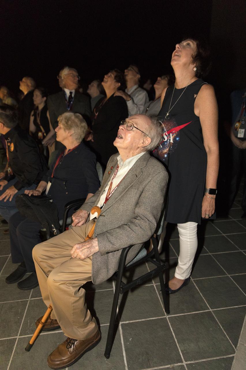 Dr. Eugene Parker (seated in the foreground), a pioneer in heliophysics and S. Chandrasekhar distinguished service professor emeritus for the Department of Astronomy and Astrophysics at the University of Chicago, watches the launch of NASA's Parker Solar Probe. This is the first agency mission named for a living person. Standing behind Parker is Nicky Fox, Parker Solar Probe project scientist at Johns Hopkins Applied Physics Laboratory. The liftoff took place at 3:31 a.m. EDT on Sunday, Aug. 12, 2018. The spacecraft was built by the Johns Hopkins University Applied Physics Laboratory in Laurel, Maryland. The mission will perform the closest-ever observations of a star when it travels through the Sun's atmosphere, called the corona. The probe will rely on measurements and imaging to revolutionize our understanding of the corona and the Sun-Earth connection.
