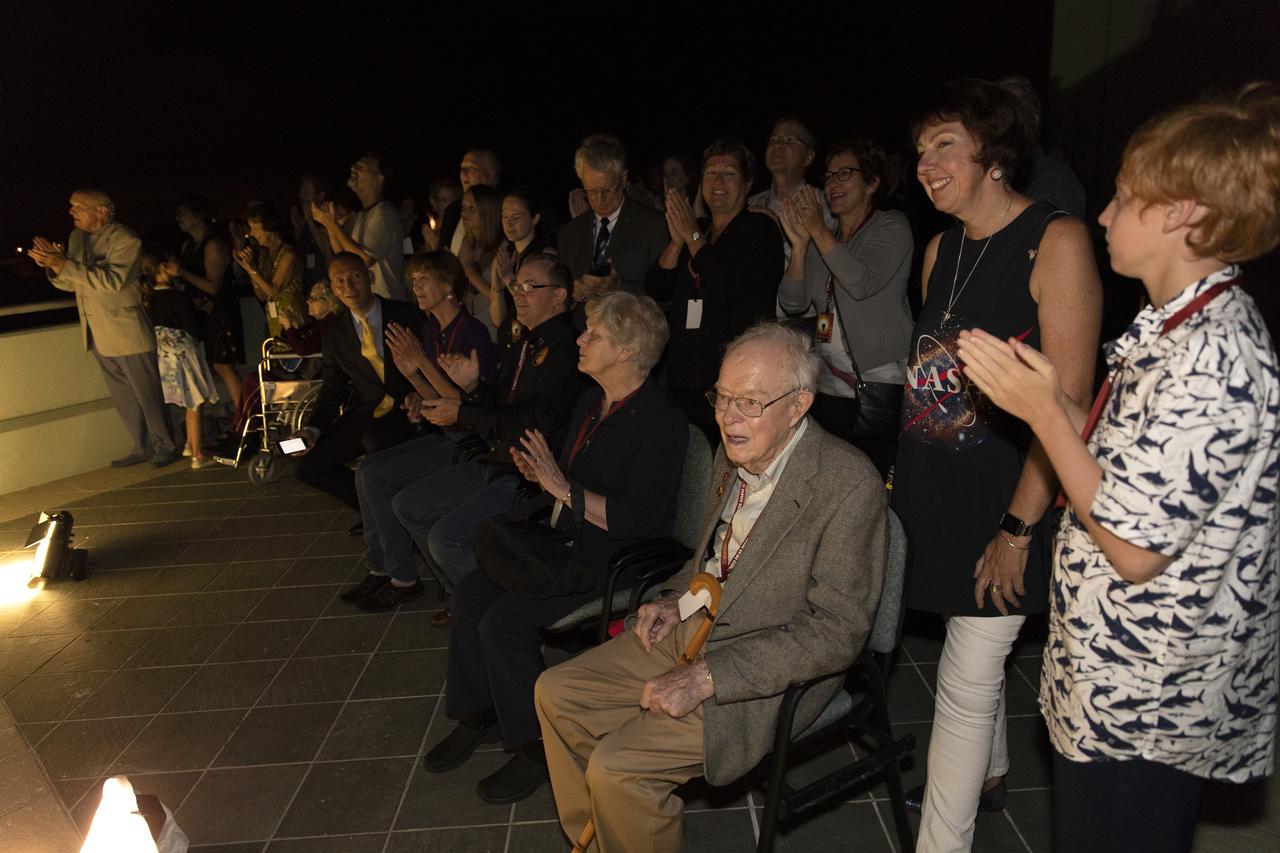 Dr. Eugene Parker (seated in the foreground), a pioneer in heliophysics and S. Chandrasekhar distinguished service professor emeritus for the Department of Astronomy and Astrophysics at the University of Chicago, watches the launch of NASA's Parker Solar Probe. This is the first agency mission named for a living person. Standing behind Parker is Nicky Fox, Parker Solar Probe project scientist at Johns Hopkins Applied Physics Laboratory. The liftoff took place at 3:31 a.m. EDT on Sunday, Aug. 12, 2018. The spacecraft was built by the Johns Hopkins University Applied Physics Laboratory in Laurel, Maryland. The mission will perform the closest-ever observations of a star when it travels through the Sun's atmosphere, called the corona. The probe will rely on measurements and imaging to revolutionize our understanding of the corona and the Sun-Earth connection.