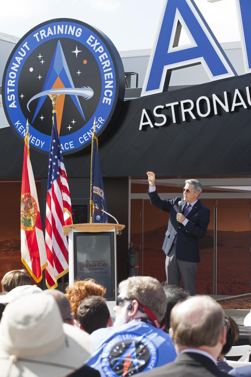 Kennedy Space Center Director Bob Cabana speaks to guests attending the opening ceremony for the new Astronaut Training Experience (ATX) at the Kennedy Space Center Visitor Complex. The ATX uses three-dimensional computer display simulation technology to "transport" participants to Mars, training them to live and work in the environment of the Red Planet. The educational experience also teaches what it’s like to travel there. The facility uses NASA science to address engineering challenges in space travel. Lockheed Martin is the title sponsor for the Astronaut Training Experience.