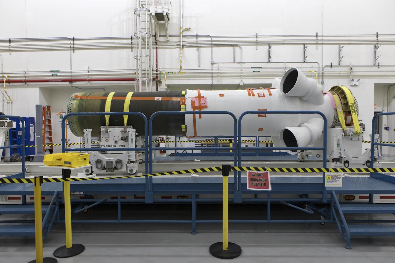 The abort motor for Orion's Launch Abort System (LAS) is secured on a work stand inside the Launch Abort System Facility on Aug. 28, 2018, at NASA's Kennedy Space Center in Florida. This motor will be used for flight during a full-stress test of the LAS, called Ascent Abort-2 (AA-2) flight test, scheduled for April 2019. The abort motor is what will activate to pull the Orion crew module away during the event of an emergency during ascent. AA-2 will launch from Space Launch Complex 46, carrying a fully functional LAS and a 22,000-pound Orion test vehicle to an altitude of 31,000 feet and traveling at more than 1,000 miles an hour. The test will verify the LAS can steer the crew module and astronauts aboard to safety in the event of an issue with the Space Launch System (SLS) rocket when the spacecraft is under the highest aerodynamic loads it will experience during a rapid climb into space. NASA's Orion and Exploration Ground Systems programs and contractors from Jacob's and Northrup Grumman in conjunction with the Air Force Space and Missile Center's Launch Operations branch are performing flight operations for AA-2.