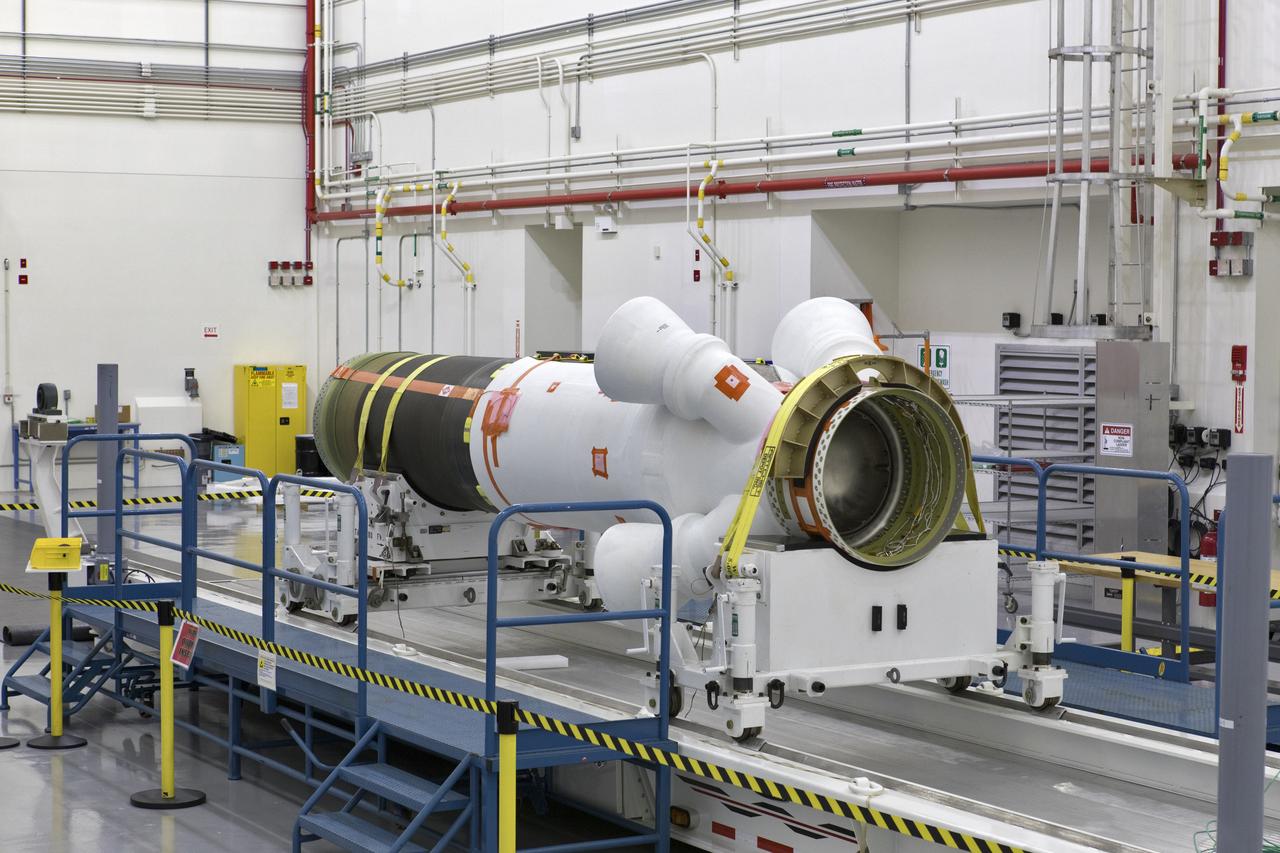 The abort motor for Orion's Launch Abort System (LAS) is secured on a work stand inside the Launch Abort System Facility on Aug. 28, 2018, at NASA's Kennedy Space Center in Florida. This motor will be used for flight during a full-stress test of the LAS, called Ascent Abort-2 (AA-2) flight test, scheduled for April 2019. The abort motor is what will activate to pull the Orion crew module away during the event of an emergency during ascent. AA-2 will launch from Space Launch Complex 46, carrying a fully functional LAS and a 22,000-pound Orion test vehicle to an altitude of 31,000 feet and traveling at more than 1,000 miles an hour. The test will verify the LAS can steer the crew module and astronauts aboard to safety in the event of an issue with the Space Launch System (SLS) rocket when the spacecraft is under the highest aerodynamic loads it will experience during a rapid climb into space. NASA's Orion and Exploration Ground Systems programs and contractors from Jacob's and Northrup Grumman in conjunction with the Air Force Space and Missile Center's Launch Operations branch are performing flight operations for AA-2.