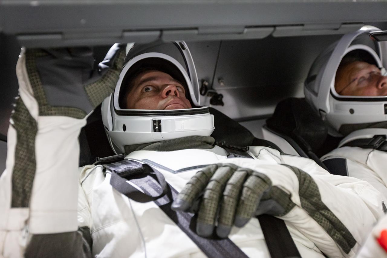 NASA astronauts Doug Hurley and Bob Behnken familiarize themselves with SpaceX’s Crew Dragon, the spacecraft that will transport them to the International Space Station as part of NASA’s Commercial Crew Program. Their upcoming flight test is known as Demo-2, short for Demonstration Mission 2. The Crew Dragon will launch on SpaceX’s Falcon 9 rocket from Launch Complex 39A at NASA’s Kennedy Space Center in Florida. In March 2019, SpaceX completed an uncrewed flight test of Crew Dragon known as Demo-1, which was designed to validate end-to-end systems and capabilities, bringing NASA closer to certification of SpaceX systems to fly a crew.