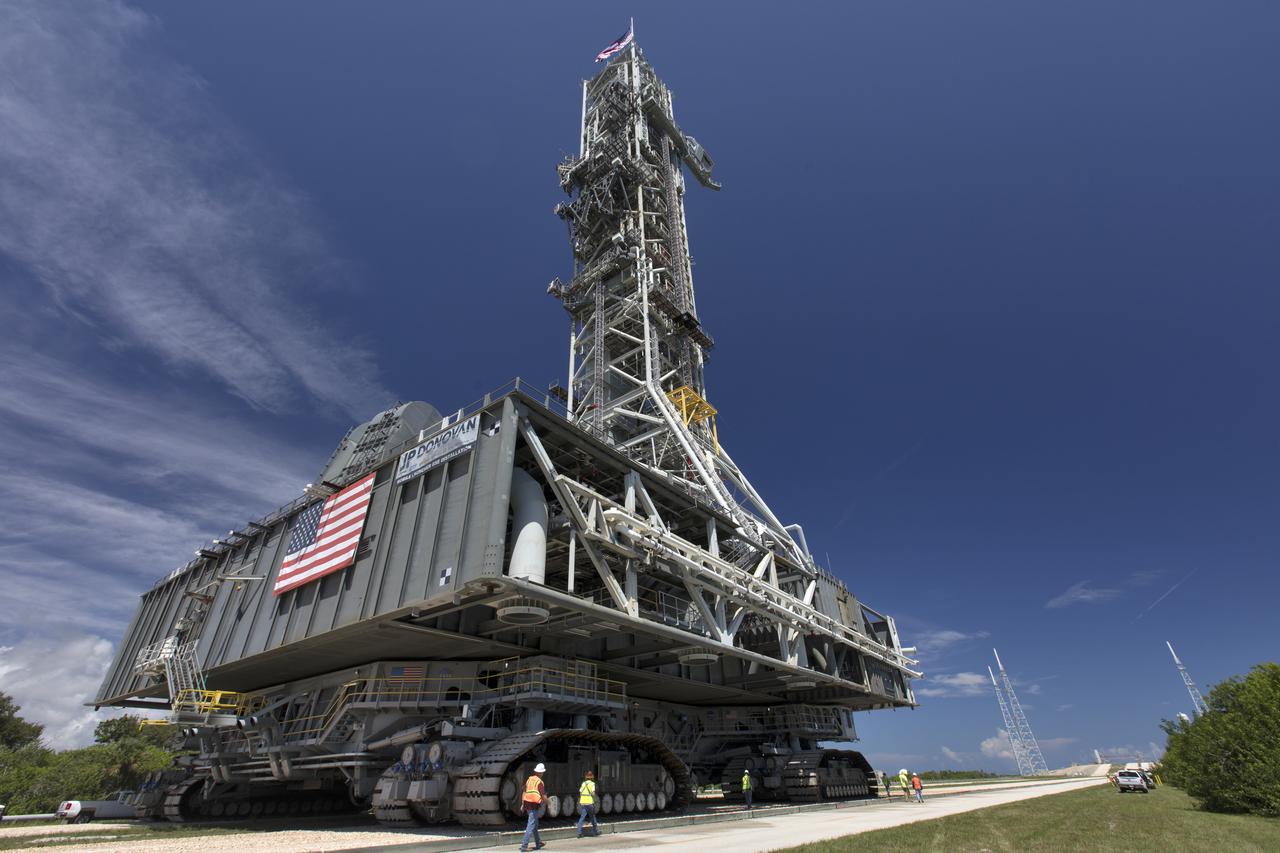 NASA's mobile launcher (ML) atop crawler-transporter 2 approaches Launch Pad 39B on Aug. 31, 2018, at the agency's Kennedy Space Center in Florida. The ML will undergo a fit check, followed by several days of systems testing. The 380-foot-tall mobile launcher is equipped with the crew access arm and several umbilicals that will provide power, environmental control, pneumatics, communication and electrical connections to NASA's Space Launch System (SLS) and Orion spacecraft. Exploration Ground Systems is preparing the ground systems necessary to launch SLS and Orion on Exploration Mission-1, missions to the Moon and on to Mars.