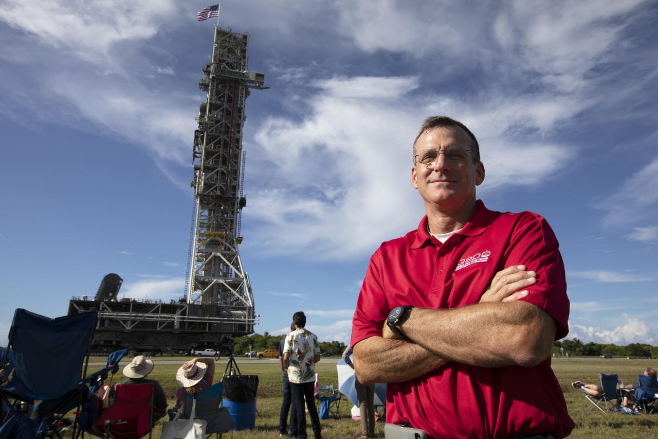 Cliff Lanham, NASA project manager for the mobile launcher, takes a break to attend the employee event for the mobile launcher move to the Vehicle Assembly Building (VAB) on Sept. 7, 2018, at NASA's Kennedy Space Center in Florida. The mobile launcher, atop crawler-transporter 2, began its trek from Launch Pad 39B along the crawlerway after undergoing a fit check and several days of systems testing with the pad. This is the first time that the modified mobile launcher made the trip to the pad. The 380-foot-tall mobile launcher is equipped with the crew access arm and several umbilicals that will provide power, environmental control, pneumatics, communication and electrical connections to the agency's Space Launch System and Orion spacecraft. The mobile launcher will spend seven months in the VAB undergoing testing. Exploration Ground Systems is preparing the ground systems necessary to launch SLS and Orion on Exploration Mission-1, missions to the Moon and on to Mars.