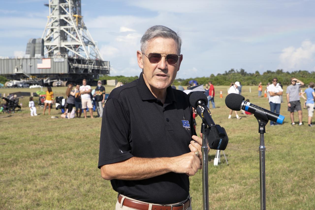 Kennedy Space Center Director Bob Cabana speaks to workers and guests during an employee event for the mobile launcher move to the Vehicle Assembly Building (VAB) on Sept. 7, 2018, at NASA's Kennedy Space Center in Florida. The mobile launcher, atop crawler-transporter 2, began its trek from Launch Pad 39B along the crawlerway after undergoing a fit check and several days of systems testing with the pad. This is the first time that the modified mobile launcher made the trip to the pad. The 380-foot-tall mobile launcher is equipped with the crew access arm and several umbilicals that will provide power, environmental control, pneumatics, communication and electrical connections to the agency's Space Launch System and Orion spacecraft. The mobile launcher will spend seven months in the VAB undergoing testing. Exploration Ground Systems is preparing the ground systems necessary to launch SLS and Orion on Exploration Mission-1, missions to the Moon and on to Mars.