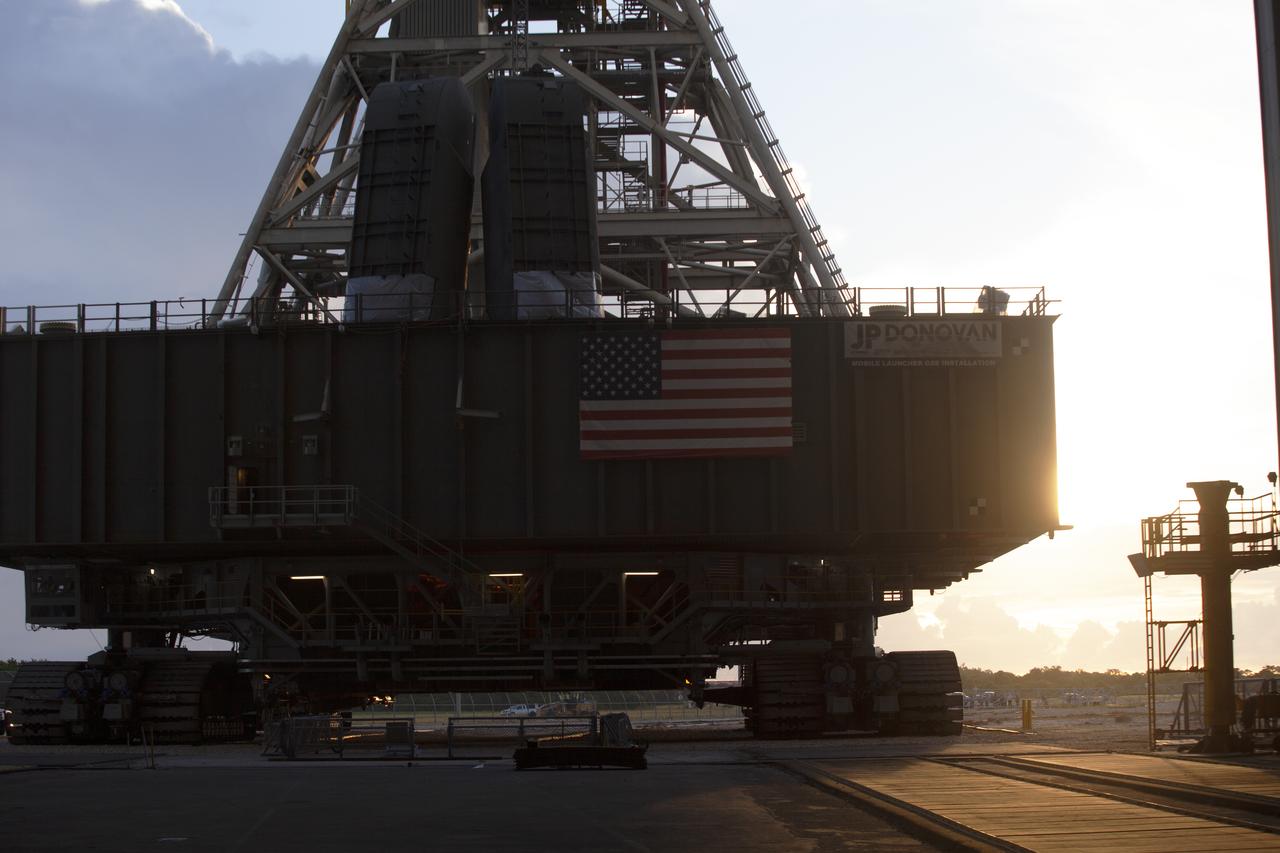 Preparations are underway to move NASA's mobile launcher, atop crawler-transporter 2, into High Bay 3 at the Vehicle Assembly Building (VAB) on Sept. 8, 2018, at NASA's Kennedy Space Center in Florida. The mobile launcher departed Launch Pad 39B after several days of testing with the pad. This is the first time that the modified mobile launcher made the trip to the pad and the VAB. The mobile launcher will spend seven months in the VAB undergoing testing. The 380-foot-tall structure is equipped with the crew access arm and several umbilicals that will provide power, environmental control, pneumatics, communication and electrical connections to the agency's Space Launch System and Orion spacecraft. Exploration Ground Systems is preparing the ground systems necessary to launch SLS and Orion on Exploration Mission-1, missions to the Moon and on to Mars.