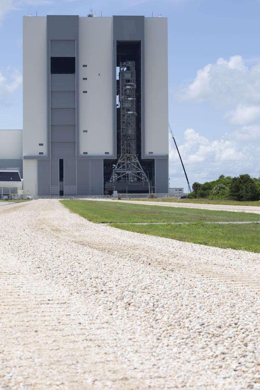 NASA's mobile launcher is inside High Bay 3 at the Vehicle Assembly Building (VAB) on Sept. 11, 2018, at NASA's Kennedy Space Center in Florida. The mobile launcher departed Launch Pad 39B after several days of testing with the pad. This is the first time that the modified mobile launcher made the trip to the pad and the VAB. The mobile launcher will spend seven months in the VAB undergoing testing. The 380-foot-tall structure is equipped with the crew access arm and several umbilicals that will provide power, environmental control, pneumatics, communication and electrical connections to the agency's Space Launch System and Orion spacecraft. Exploration Ground Systems is preparing the ground systems necessary to launch SLS and Orion on Exploration Mission-1, missions to the Moon and on to Mars.