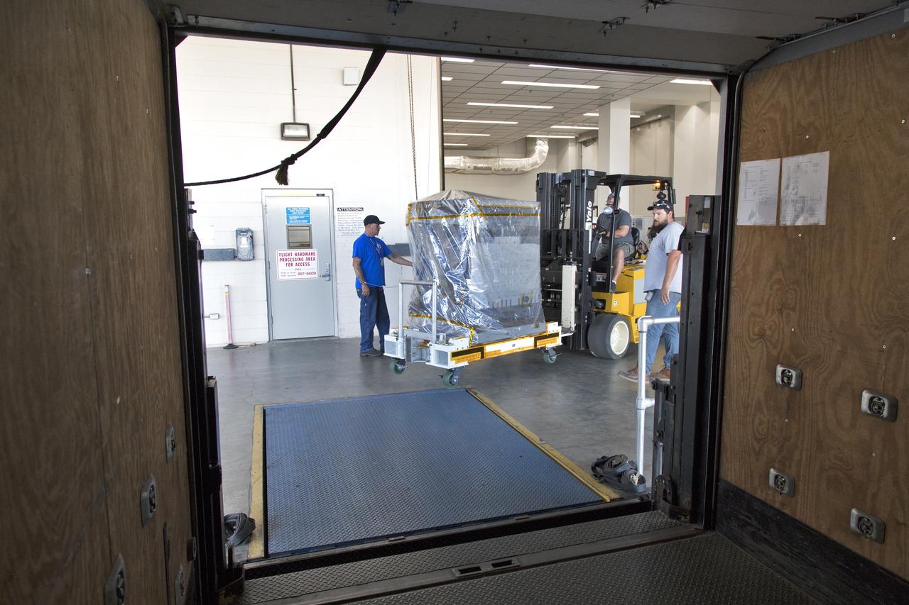 Workers prepare to transfer the Robotic Refueling Mission-3 (RRM3) payload from the Space Station Processing Facility high bay to the Payload Hazardous Servicing Facility on Oct. 3, 2018, at NASA's Kennedy Space Center in Florida. The payload will be carried to the International Space Station on SpaceX's 16th Commercial Resupply Services mission. RRM3 demonstrates the transfer of xenon gas and liquid methane in microgravity, and advances technologies for storing and manipulating these cryogenic fuels robotically. RRM3 also supports development of technology for the Restore-L mission, a robotic spacecraft equipped to service satellites in-orbit.