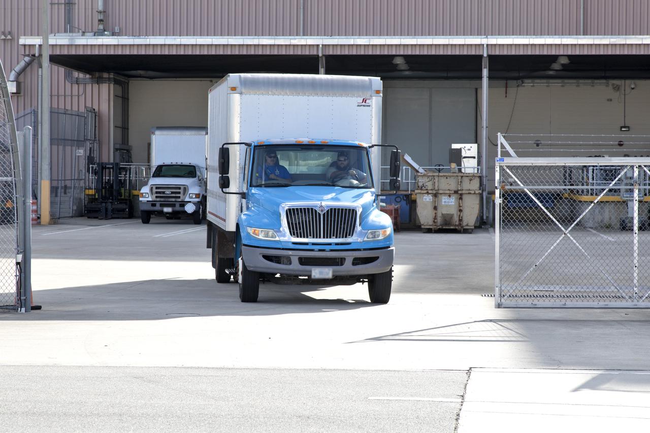 A truck carrying the Robotic Refueling Mission-3 (RRM3) payload departs from the Space Station Processing Facility on its way to the Payload Hazardous Servicing Facility on Oct. 3, 2018, at NASA's Kennedy Space Center in Florida. The payload will be carried to the International Space Station on SpaceX's 16th Commercial Resupply Services mission. RRM3 demonstrates the transfer of xenon gas and liquid methane in microgravity, and advances technologies for storing and manipulating these cryogenic fuels robotically. RRM3 also supports development of technology for the Restore-L mission, a robotic spacecraft equipped to service satellites in-orbit.
