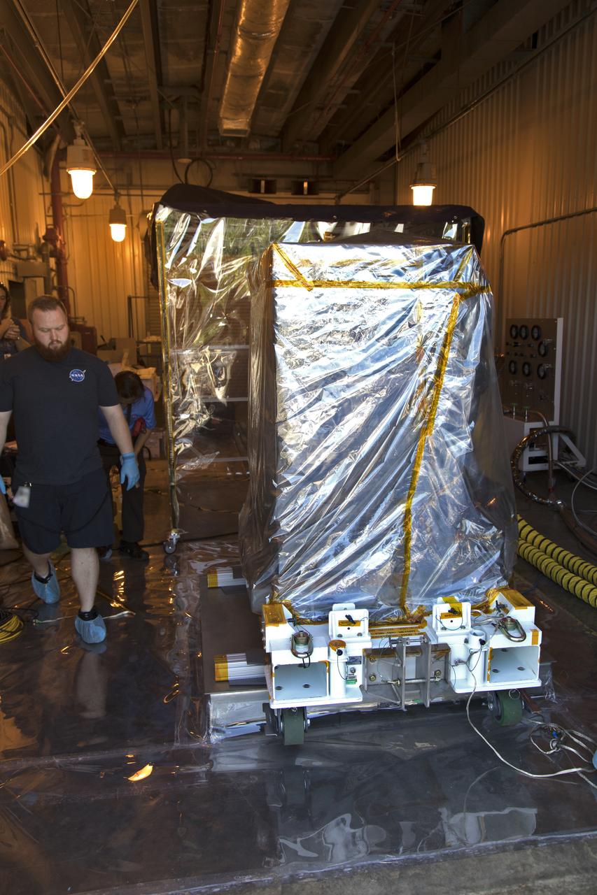 The Robotic Refueling Mission-3 (RRM3) payload is inside the Payload Hazardous Servicing Facility on Oct. 3, 2018, at NASA's Kennedy Space Center in Florida. The payload will be carried to the International Space Station on SpaceX's 16th Commercial Resupply Services mission. RRM3 demonstrates the transfer of xenon gas and liquid methane in microgravity, and advances technologies for storing and manipulating these cryogenic fuels robotically. RRM3 also supports development of technology for the Restore-L mission, a robotic spacecraft equipped to service satellites in-orbit.