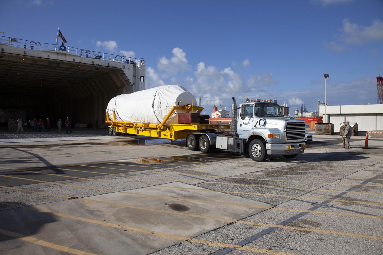 A transport truck moves a United Launch Alliance (ULA) two-engine Centaur upper stage from the company’s Mariner ship that just arrived at Port Canaveral in Florida. The Centaur will be transported to the Atlas Spaceflight Operations Center at Cape Canaveral Air Force Station for preliminary checkouts. Mounted atop a ULA Atlas V rocket, the Centaur will help launch a Boeing CST-100 Starliner spacecraft on an uncrewed Orbital Flight Test from Space Launch Complex 41 at the Cape. NASA’s Commercial Crew Program will return human spaceflight launches to U.S. soil, providing safe, reliable and cost-effective access to low-Earth orbit on systems that meet our safety and mission requirements.