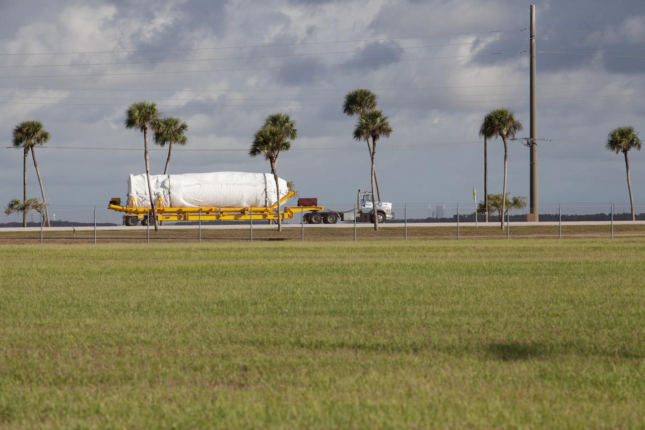 A truck transports a United Launch Alliance (ULA) two-engine Centaur upper stage from Port Canaveral in Florida to the Atlas Spaceflight Operations Center at Cape Canaveral Air Force Station for preliminary checkouts. Mounted atop a ULA Atlas V rocket, the Centaur will help launch a Boeing CST-100 Starliner spacecraft on an uncrewed Orbital Flight Test from Space Launch Complex 41 at the Cape. NASA’s Commercial Crew Program will return human spaceflight launches to U.S. soil, providing safe, reliable and cost-effective access to low-Earth orbit on systems that meet our safety and mission requirements.