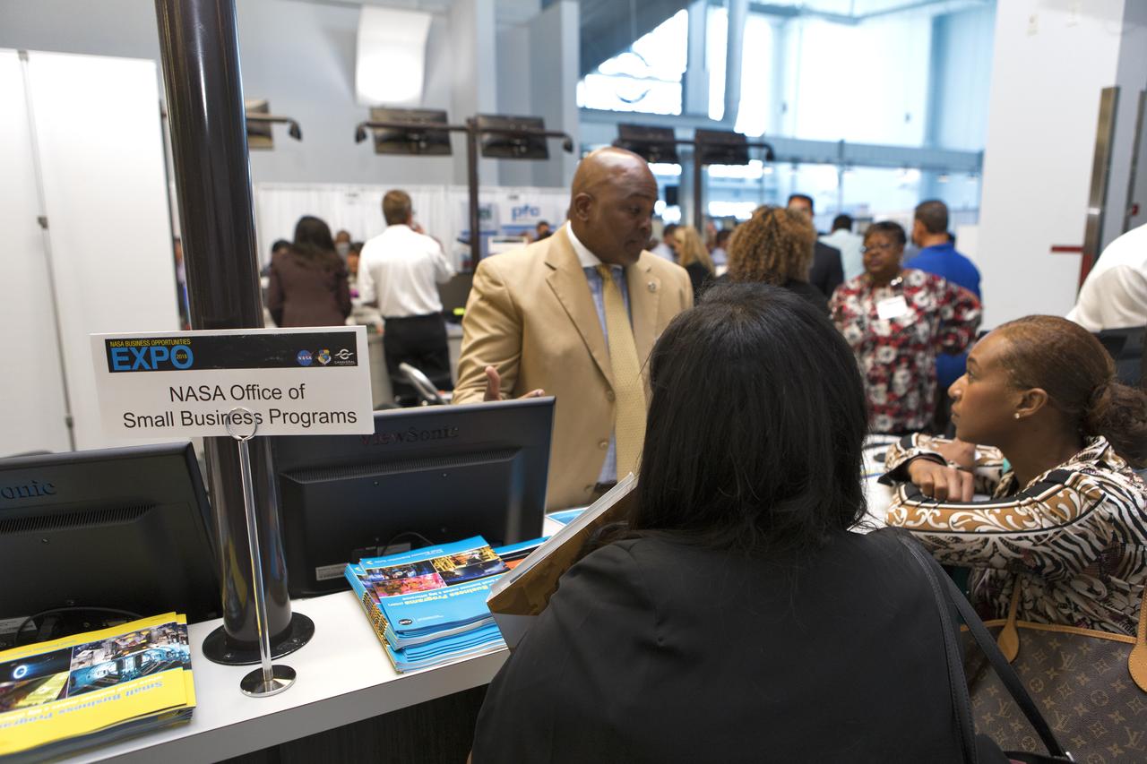 An attendee talks to representatives from the NASA Office of Small Business Programs, during the agency's Business Opportunities Expo 2018, on Oct. 23, inside Cruise Terminal 6 at Port Canaveral in Florida. The 28th Business Opportunities Expo featured more than 200 businesses, large and small, and government exhibitors from throughout the Space Coast and the nation. The Business Opportunities Expo is facilitated by Kennedy's Small Business Programs Office and Prime Contractor Board, along with the U.S. Air Force 45th Space Wing and Canaveral Port Authority. Vendors from a variety of product and service areas, such as computer technology, engineering services, communication equipment and services, and construction and safety products, to name a few, were at the expo. Representatives from the 45th Space Wing, Kennedy prime contractors, NASA and many more agencies and organizations were on hand to provide information and answer questions.